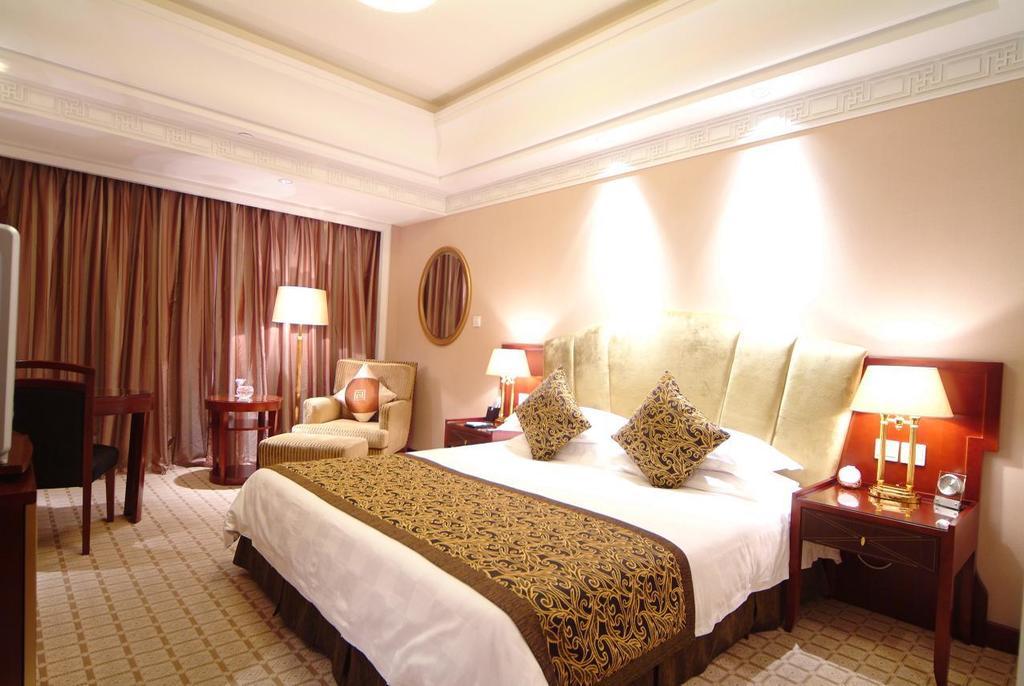 Shao Xing International Hotel Шаосин Стая снимка