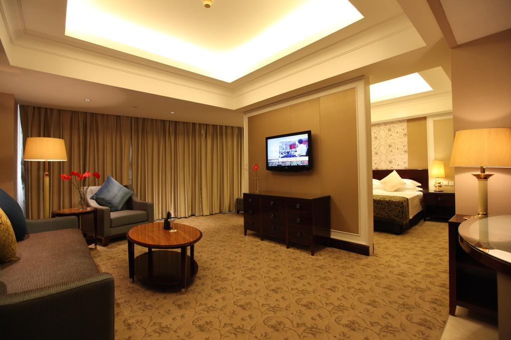 Shao Xing International Hotel Шаосин Стая снимка